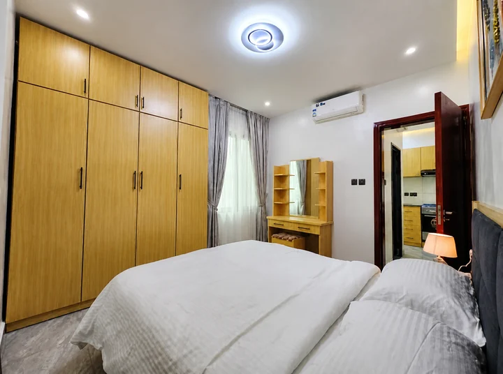 Comfortable furnished bedroom at Elevate Heights Apartment